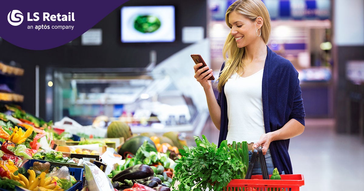 Woman grocery shopping with mobile phone